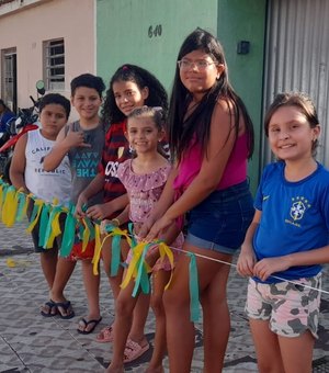 [Vídeo] Moradores do bairro São Luiz enfeitam a rua para entrar no clima da Copa do Mundo