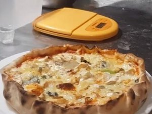 Francês usa 254 variedades de queijos em pizza e quebra recorde mundial