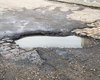 Moradores solicitam obra de drenagem e reparos em rua cheia de buracos em bairro de Arapiraca