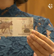 Mulher acha notas de R$ 200 no chão e paga boleto de desconhecido