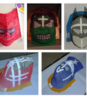 Crianças usam máscaras de seus super-heróis favoritos para fazer radioterapia