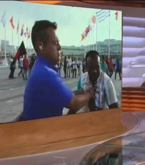 Ao vivo na Globo, Eric Faria é 'empurrado' por homem e revida; veja o vídeo