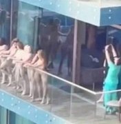 Mulheres são presas após posarem nuas em varanda de prédio