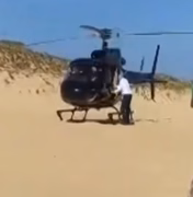 [Vídeo] Empresário do DF pousa helicóptero em praia para comprar piaba