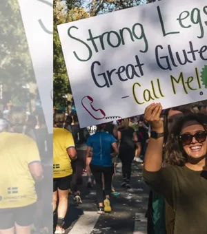 Durante maratona, mulher exibe cartaz com telefone em busca de um amor