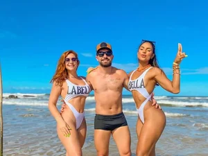 Juntos há 15 anos, advogada e empresário assumem trisal com influencer e criam perfil nas redes