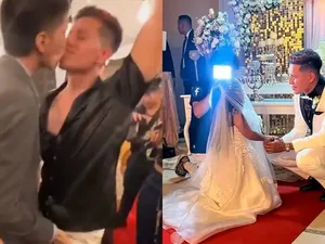 Homem beija amigo em frente a sua esposa durante seu casamento