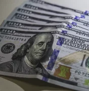 Dólar fecha praticamente estável mesmo com inflação nos EUA