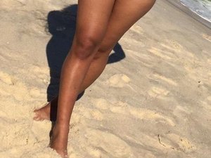 Presidente 'aparece' em joelho de banhista e foto viraliza