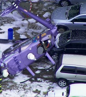 Helicóptero cai em estacionamento de emissora de TV em Osasco
