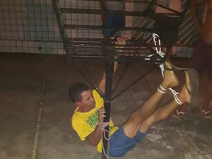 Criminoso tenta assaltar policial e termina amarrado em lixeira