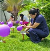 Área Lilás do HEA transforma jardim em painel de conscientização sobre violência contra a mulher
