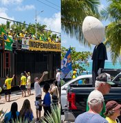 Manifestantes levam boneco com cabeça de ovo para protesto na orla de Maceió