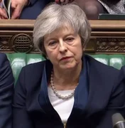 Parlamento britânico mantém May no cargo apesar de derrota no Brexit