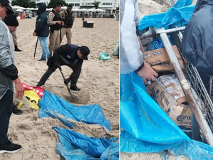 Agentes encontram depósito ilegal de bebidas enterrado na areia da praia de Copacabana