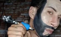 Fã se filma tatuando o próprio rosto para ficar igual a Gusttavo Lima