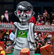 Bolsonaro é retratado como 'assassino do clima' no Carnaval alemão