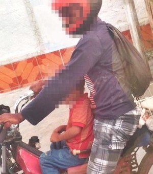 SMTT flagra homem conduzindo criança amarrada a motocicleta 
