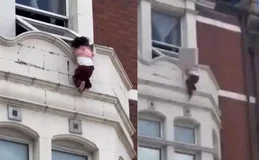 Menina fica pendurada em janela de prédio em Londres e é resgatada