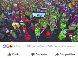 Ao som de Bell Marques, torcedor exibe bandeira do ASA no Carnaval de Salvador 