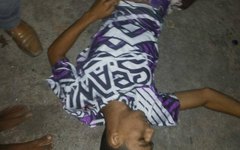 Corpo de jovem após o crime no Bairro Primavera