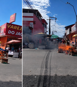 Moradores protestam por falta de água e interditam rua com fogo no Jacintinho