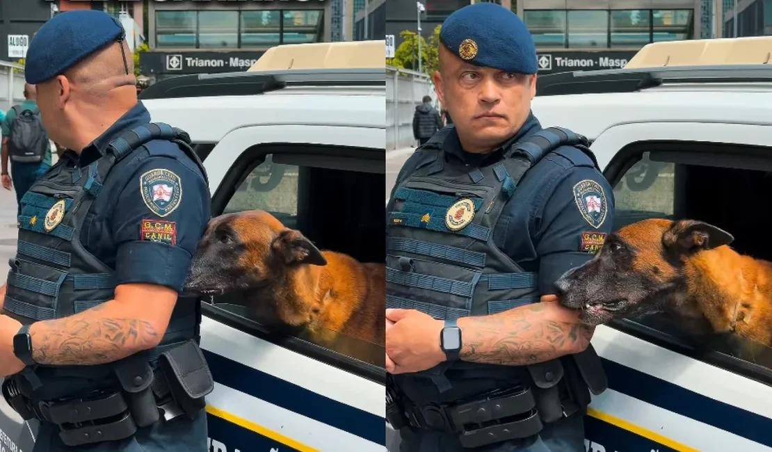 ﻿Perdeu a pose: guarda não resiste a cão pedindo carinho