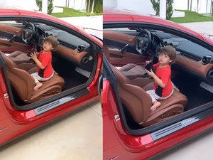 Gusttavo Lima mostra filho brincando em sua Ferrari avaliada em R$ 1,3 milhão