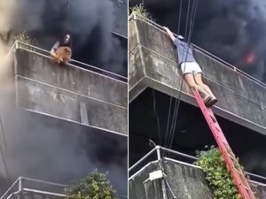Mulher salva dois cães ao lançá-los da varanda durante incêndio em apartamento
